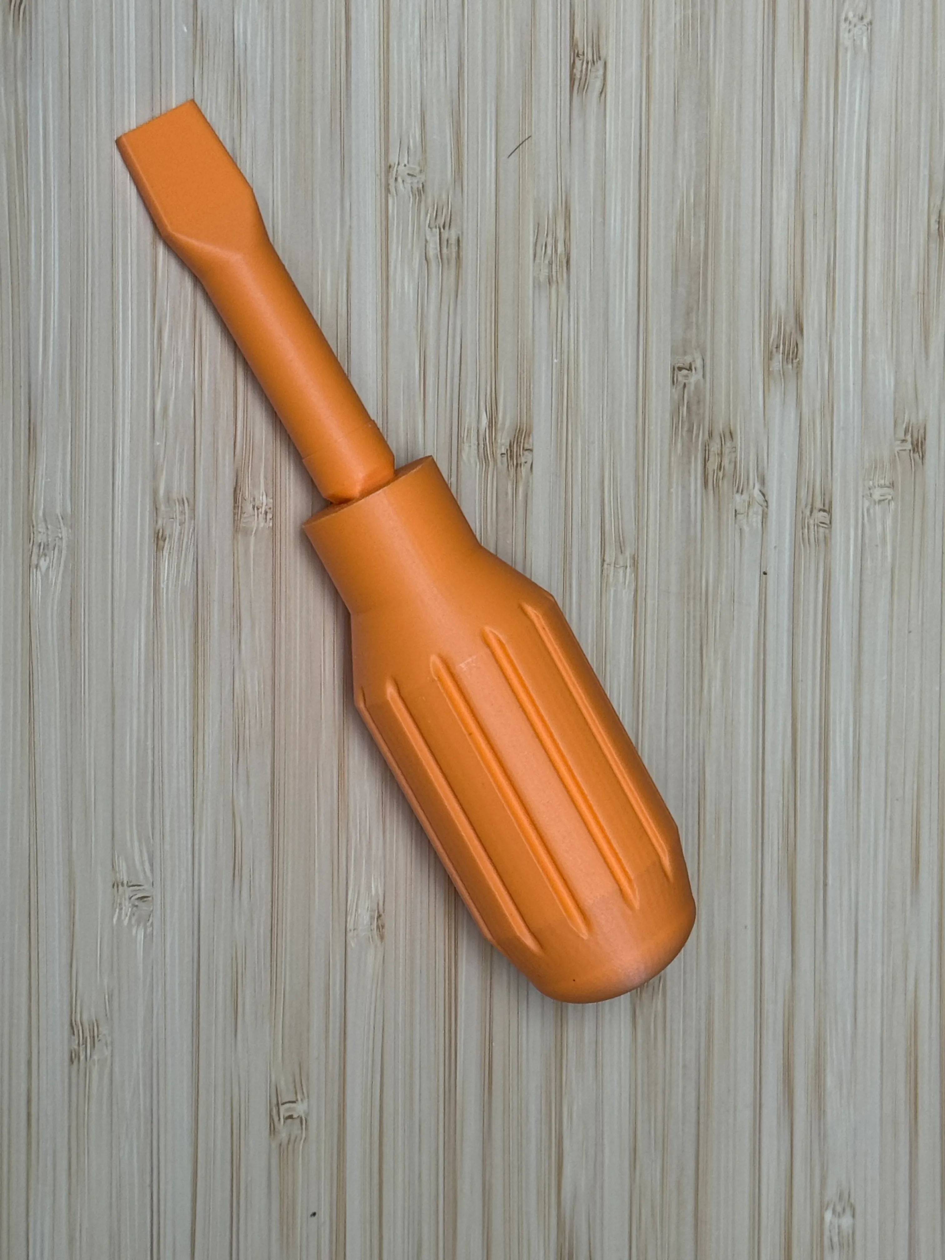 The screwdriver bit plugged into the handle
